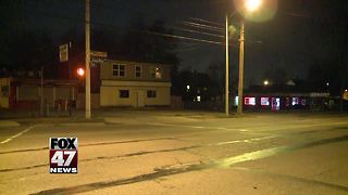 Police investigating overnight armed robbery in Lansing