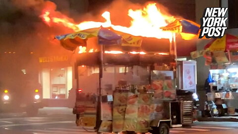 Hotdog stand on fire completely ignored by New Yorkers