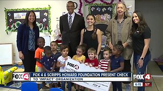 Fox 4 and Scripps Howard Foundation present check to Impact