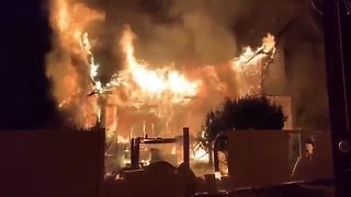 Massive fire blazes through home in Monroe