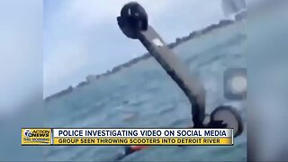 Police investigating group throwing scooters into Detroit River