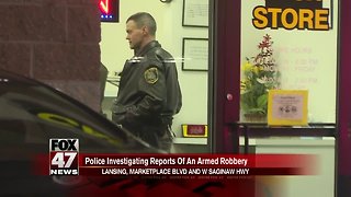 Armed robbery at cash store in Lansing