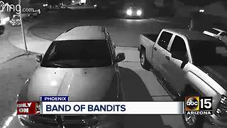 Burglars caught on video peeking into cars