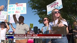 Day of immigration protests ends with candlelight vigil