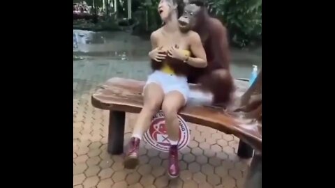 The monkey pressed the woman's 😀😀