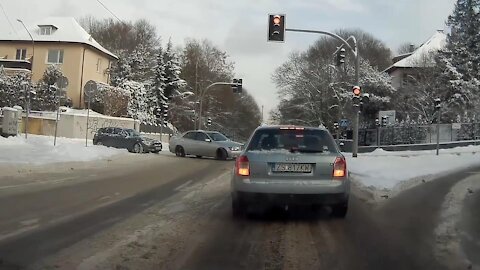 Lexus driver almost crashes into BMW after failed drift on an intersection