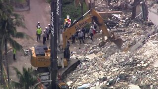 Rescuers cling to hope in Surfside condo collapse search