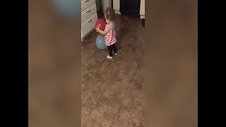 Baby Girl Learns about Balloons