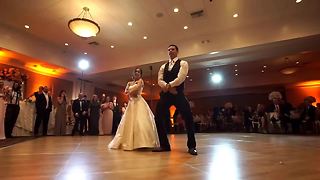 Bride And Groom Entertain Guests With Various Dance Techniques