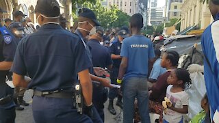 SOUTH AFRICA - Cape Town - Refugees removed from outside Central Methodist Mission (Video) (3BX)
