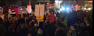 Dozens rally in Las Vegas on eve of impeachment vote