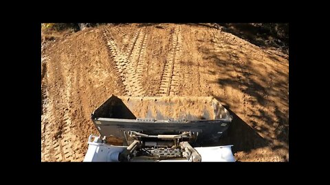 Grading low spot in driveway & building a new turnaround pad, Bobcat T650 CTL grading dirt & gravel