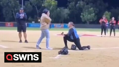 Aussie woman proposes to partner by FAKING AN INJURY during softball match