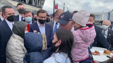 WATCH: biden @POTUS Biden meets Ukrainian refugees outside PGE Stadium in Warsaw.