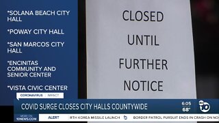 COVID surge closes city halls
