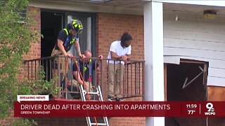 One dead after car crashes into Green Township apartment complex