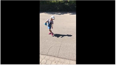 Little girl tries to run away from her own shadow