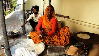 Talented Indian bread makers have a little factory behind restaurant