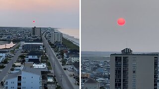 Video captures mesmerizing pink sunrise due to wildfire smoke