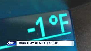 Workers battle cold weather
