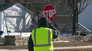 Police: Crossing guard job comes with vaccine eligibility