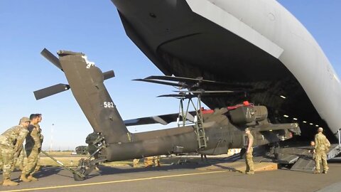 Unloading AH-64 Apache Helicopters from C-17 Globemaster III