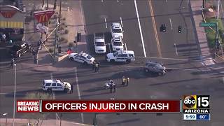 Two officers, woman hurt after Phoenix crash