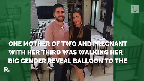 Mom Carrying Gender Reveal Balloon Doesn’t See Toddler Sneaking Up Behind Her with Toy Sword