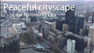 Skyscraper view of the evening Melbourne City (one take time-lapse)