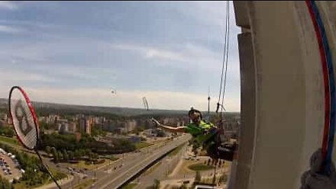 Playing badminton and abseiling at the same time? Why not!