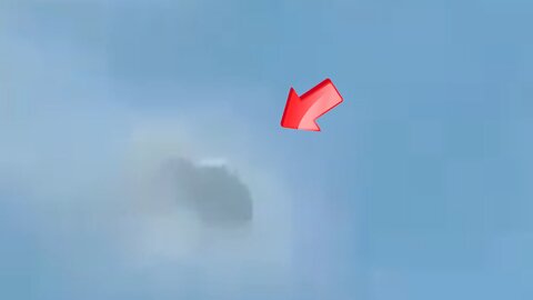 A disk-shaped UFO mimicking a cloud over a rocky mountain was seen [Space]