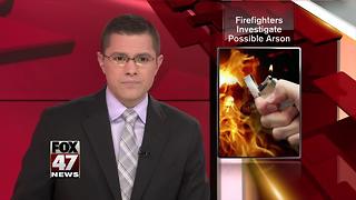 Firefighters investigate possible arson