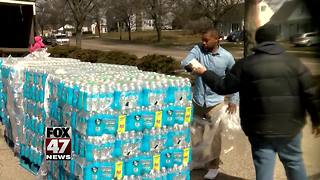 Michigan to close Flint's free bottled water sites