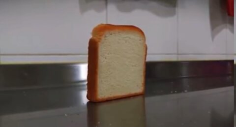 Piece of bread falling