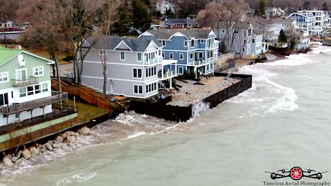 Gale force winds crash into beach homes on Lake Michigan