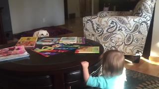 "A Tot Girl Plays Peekaboo with Her Dog"