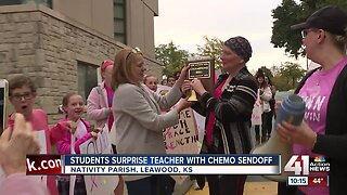 Students, staff surprise Nativity teacher on her way to final chemo session