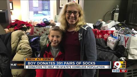 Brother and sister collect nearly 400 pairs of socks for homeless