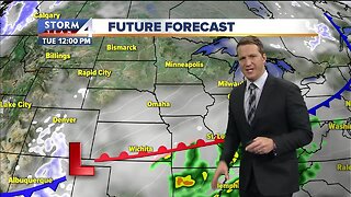 Mostly cloudy, windy Tuesday