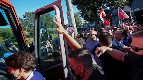 Anti-vaxxers throw gravel at Canadian prime minister Justin Trudeau