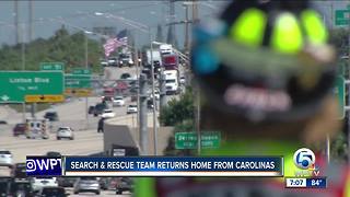 American flags above I-95 welcome firefighters