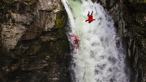 Kayaker And Daredevil Take Part In Simultaneous Waterfall Jump
