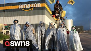 Extinction Rebellion (XR) activists block Amazon depots across the UK during Black Friday