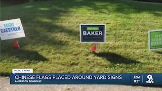 Chinese flags placed around yard signs in Anderson Township