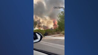 Clark County crews knock down brush fire at Sunset Park