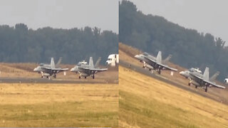 Two warplanes racing at takeoff