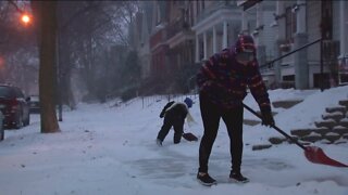 Neighbors help each other through blizzard conditions