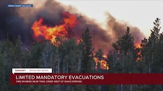 Limited evacuations are underway due to a fire burning near Idaho Springs