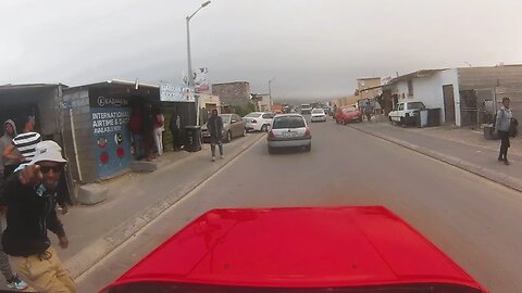 Driving thru volatile informal settlement in Cape Town, Vrygrond