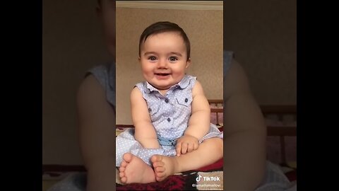 Infectious Cuteness: Adorable Baby's Contagious Laughter
